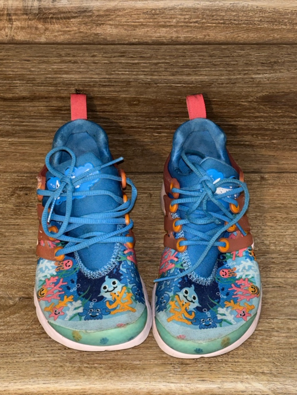 Nike Kids Blue Ocean Print Sneakers with Orange Accents